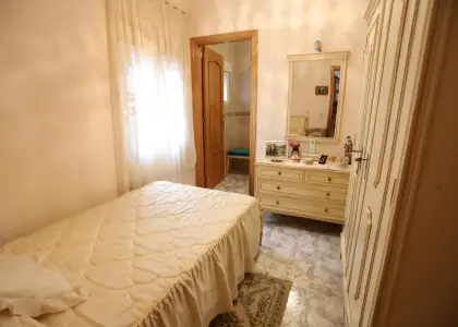 Casa a la venta totalmente equipada con 4 dormitorios, garaje y patio en Alcázar de San Juan